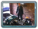 Ex F1 driver Phil Robinson proudly stood with his Imp powered special